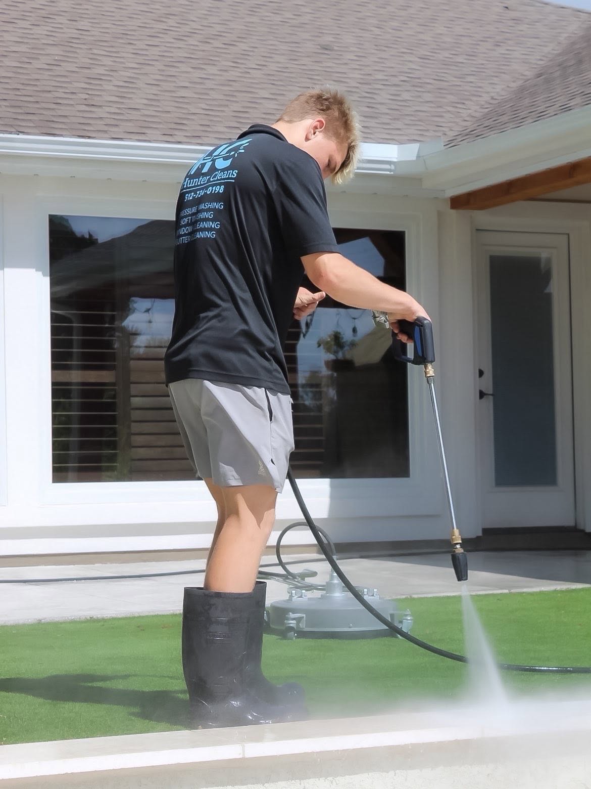 Power washing a driveway